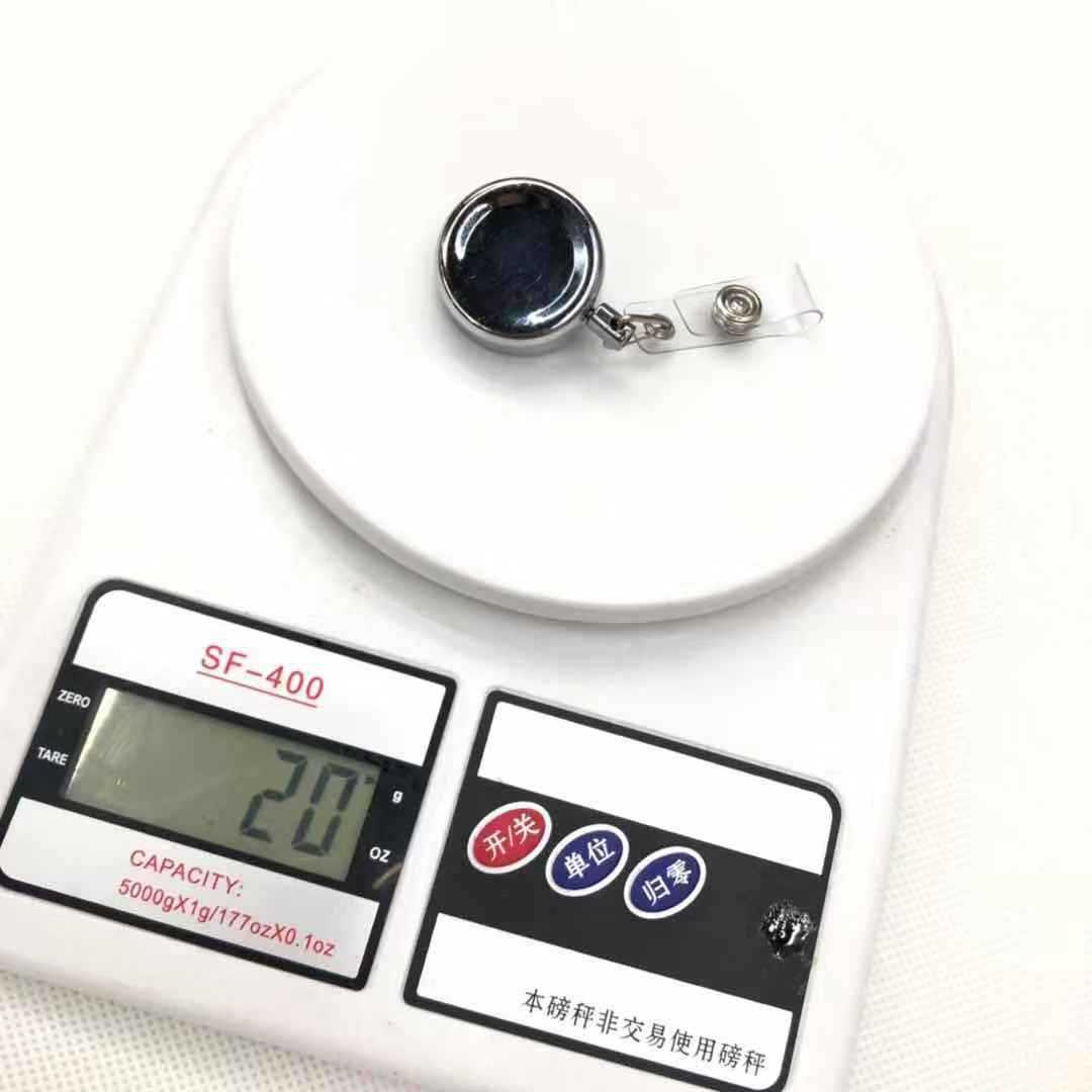 Fabricantes cocodrilo hebilla de metal hebilla telescópica de metal colgante de teléfono móvil insignia