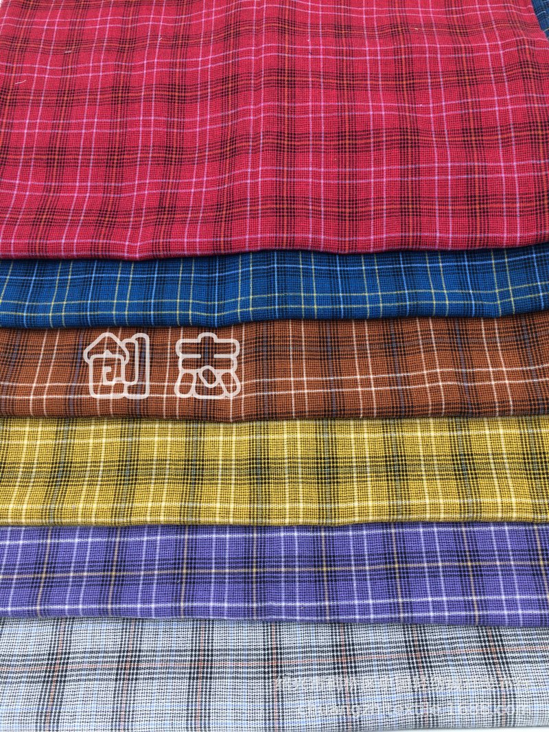 色织彩色格子衬衫面料女装春夏装梭织提花布淘现货布匹直批