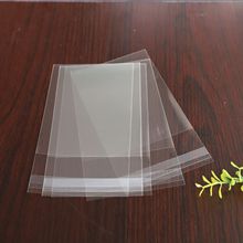 现货加厚带挂孔透明OPP胶条封口袋批发彩色印花LOGO礼品内包装袋