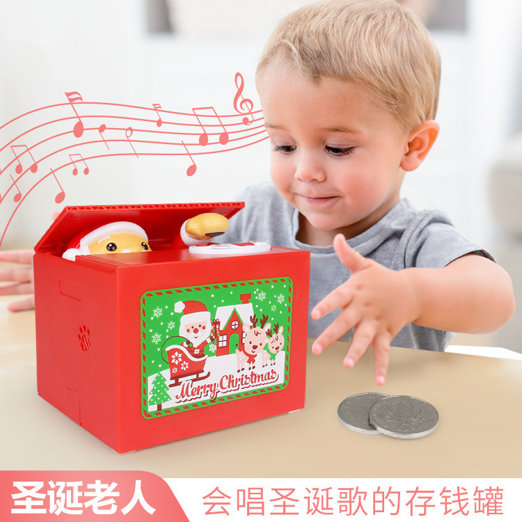 Regalo creativo música nueva KT robar dinero moneda alcancía niños de dibujos animados eléctrica robar Santa Claus