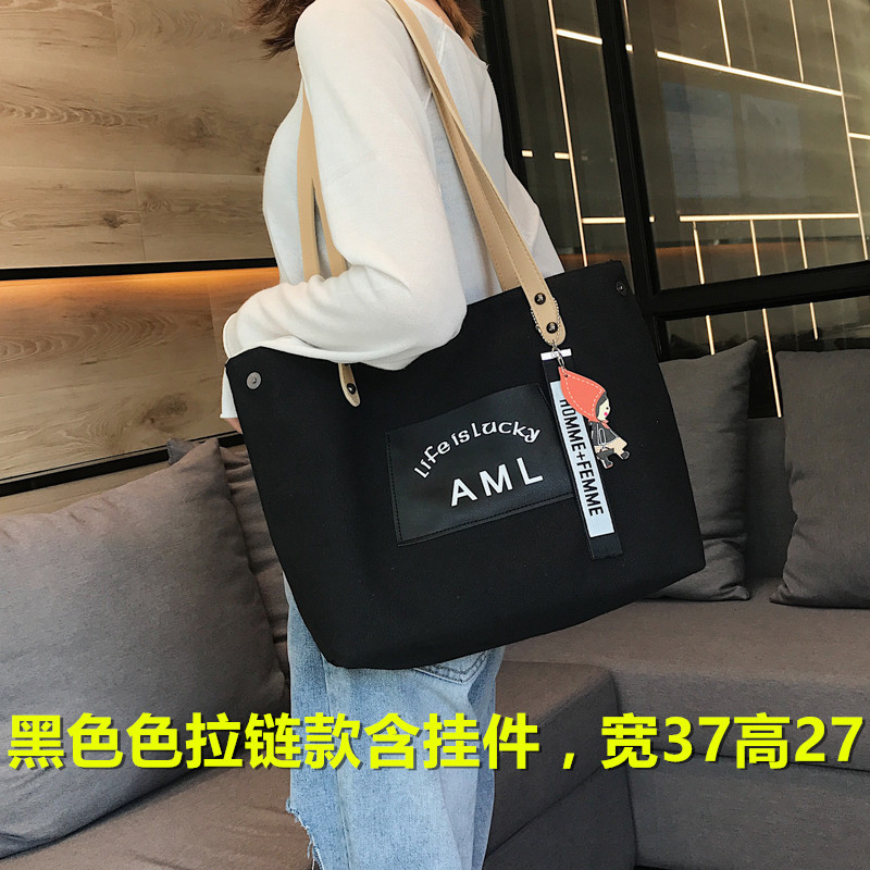 Bolso de cubo de un solo hombro de gran capacidad bolso de mensajero perezoso personalizado nuevo bolso de lona 2024 diseño de nicho femenino