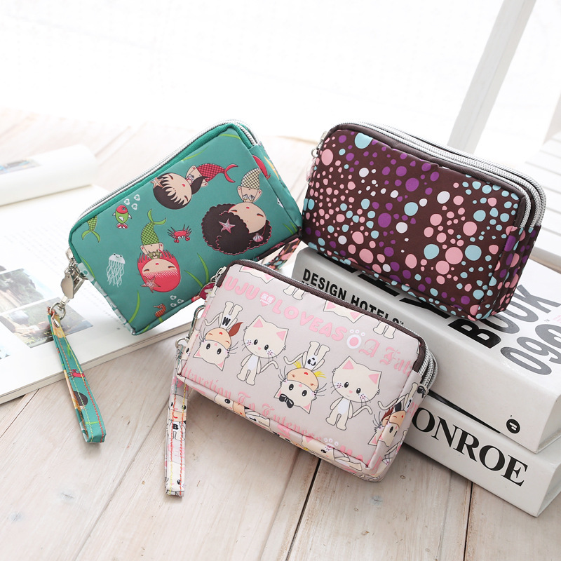 Mobile phone coin purse hand-held mini canvas bag women's bag Oxford cloth cartoon fabric bag wholesale Mobile phone coin purse hand-held mini canvas bag women's bag Oxford cloth cartoon fabric bag wholesale