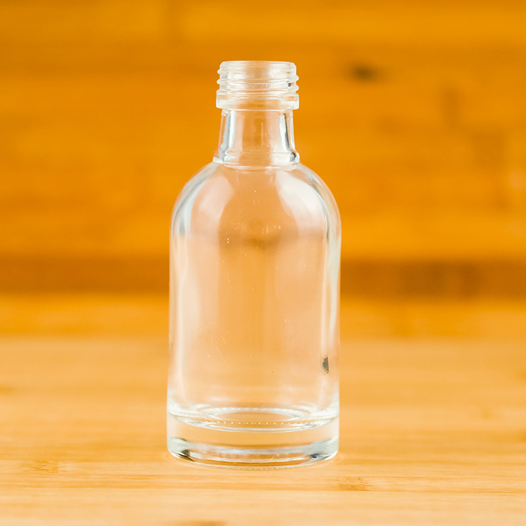 支持加工制做晶白料玻璃瓶批量供应2两丝口白酒瓶100ml螺口圆柱瓶