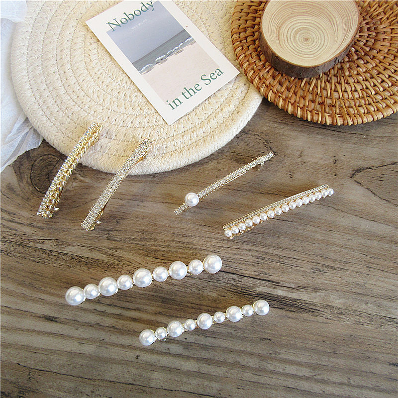 Korean style Dongdaemun style design Japanese girl heart Pearl hairpin retro Pearl Spring clip Joker clip wholesale
