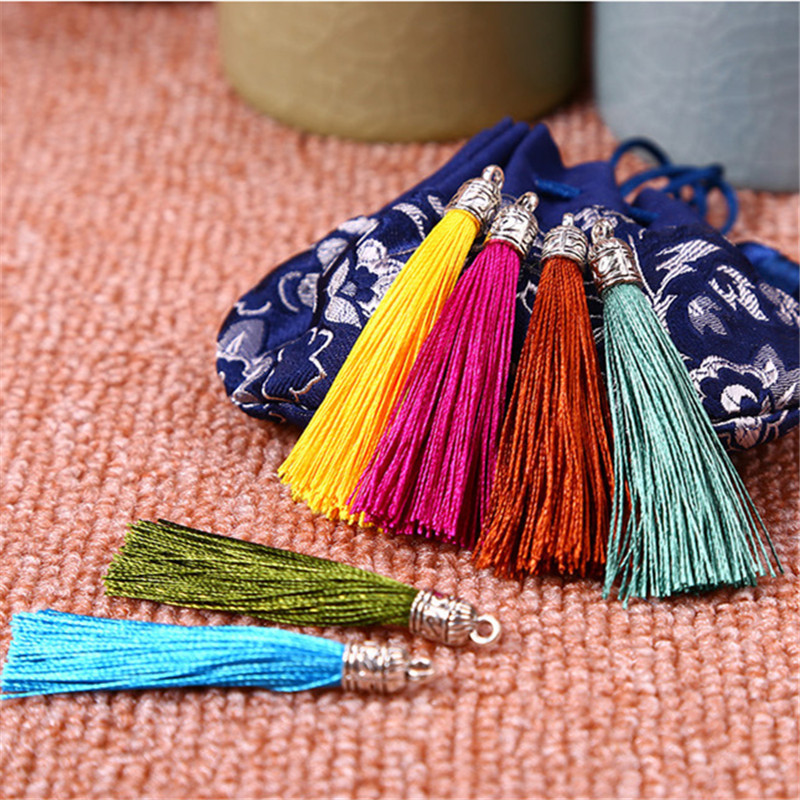 Metal earrings with tassels