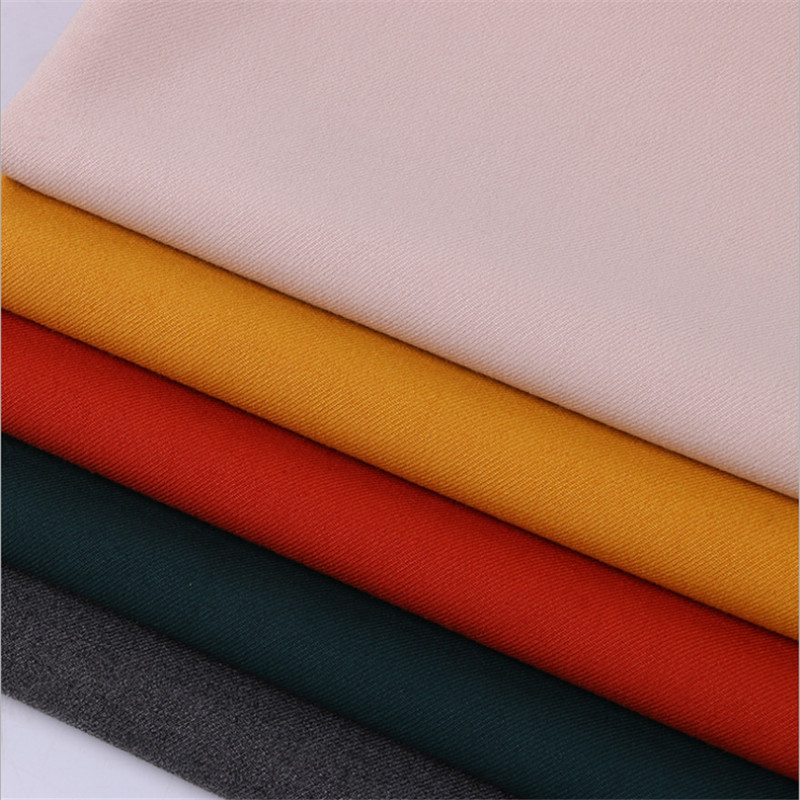 TR纬弹斜纹32*16+70D 91*68坯布染色织印花罐蒸轧光+双层提花拉毛