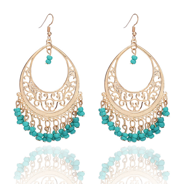 Fashionable matte elegant trend earrings with tassels