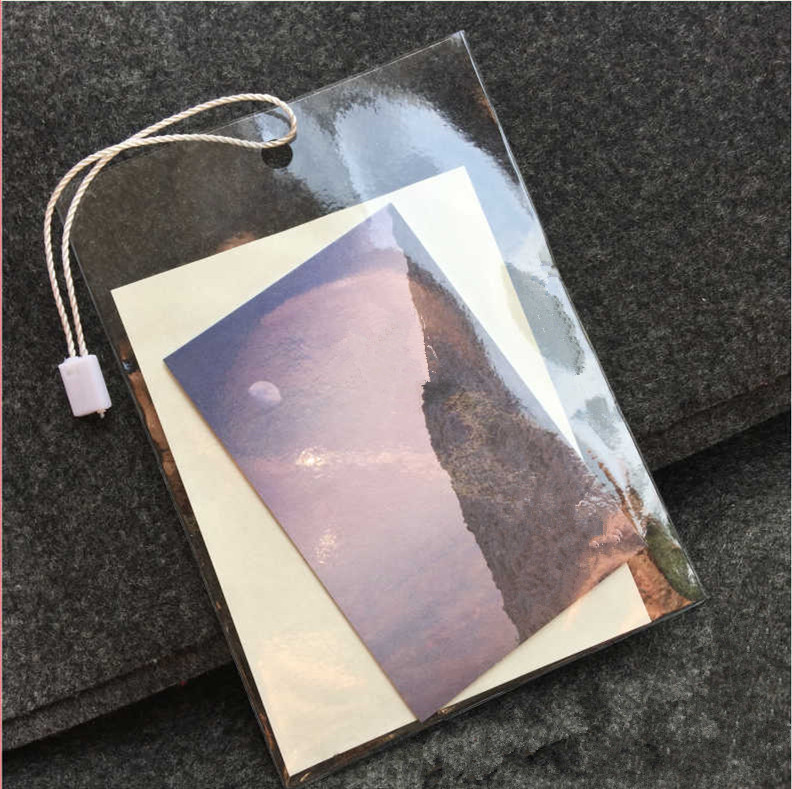 东莞塑料袋工厂批发服装吊牌套加厚透明OPP平口价格标织唛领标套