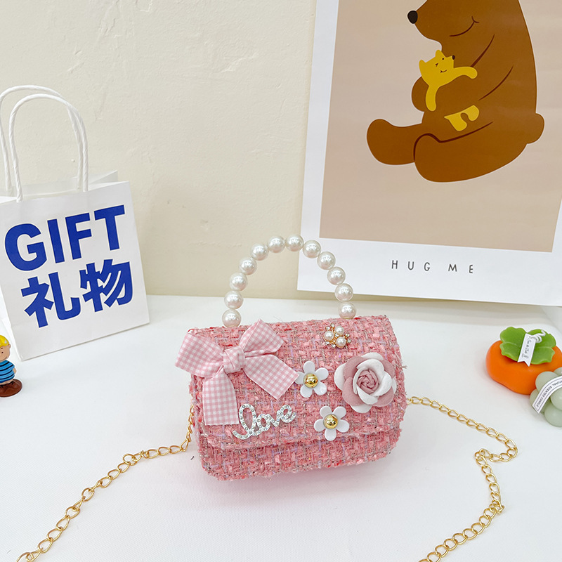 2025 nueva versión coreana de lana de lana, algodón, lino, niños, lazo, perlas, accesorios portátiles, bolsos, bolsos, bolsos de mujer