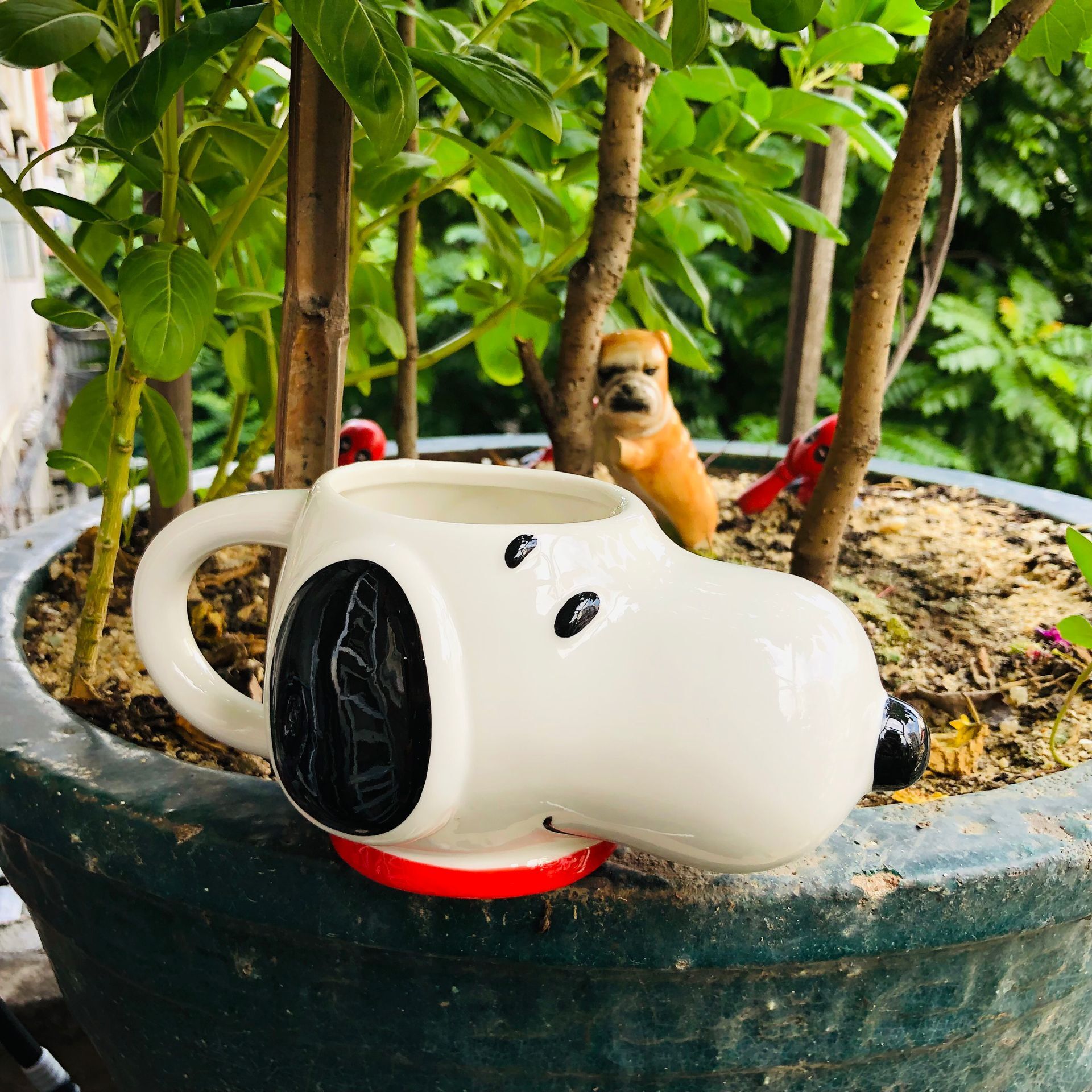 Lindo cachorro de dibujos animados Snoopy Taza de cerámica con mango Snoopy Taza de cerámica titular de la pluma Decoración