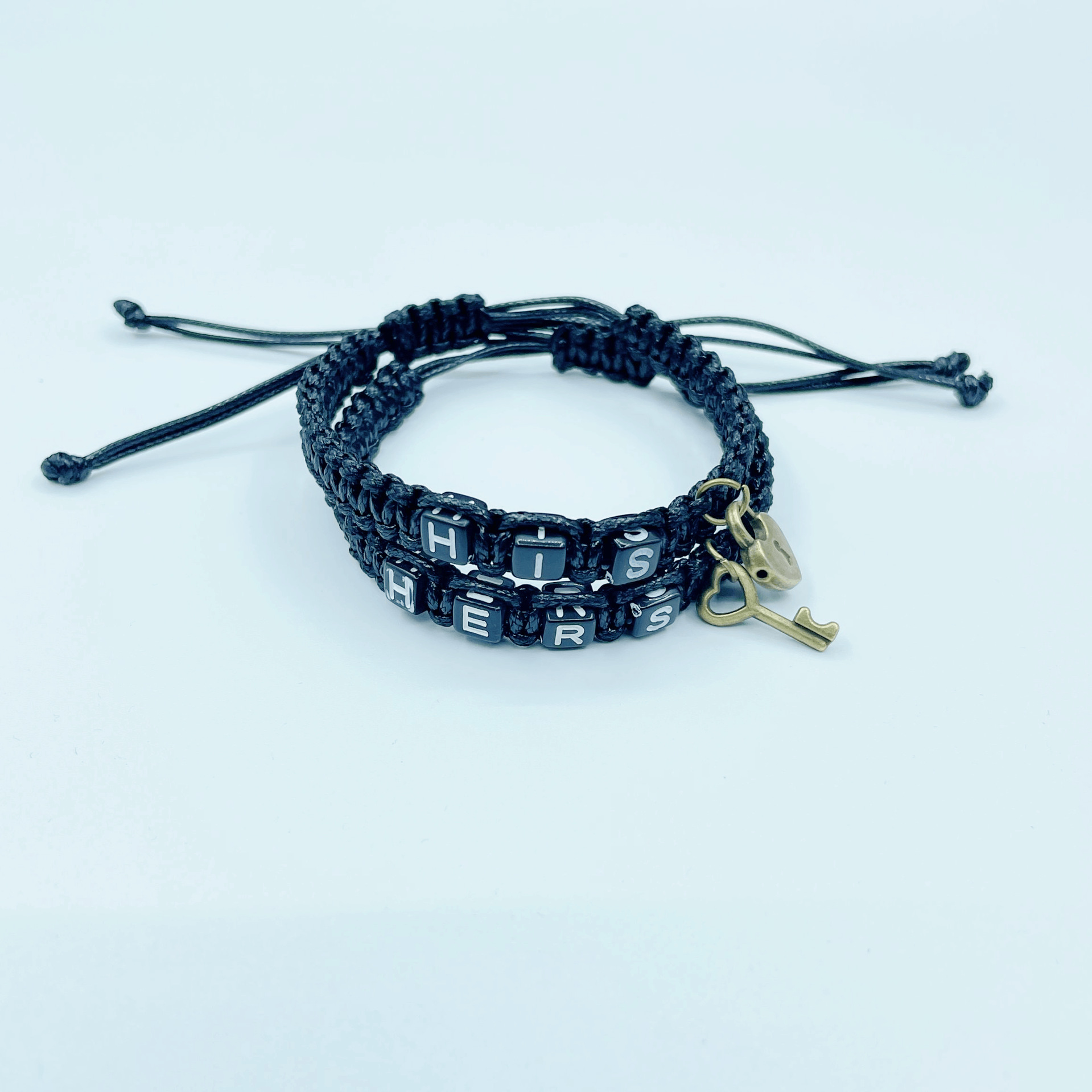 Venta caliente europea y americana su HERS pareja pulsera cerradura núcleo clave colgante tejido cordón pulsera transfronteriza joyería al por mayor