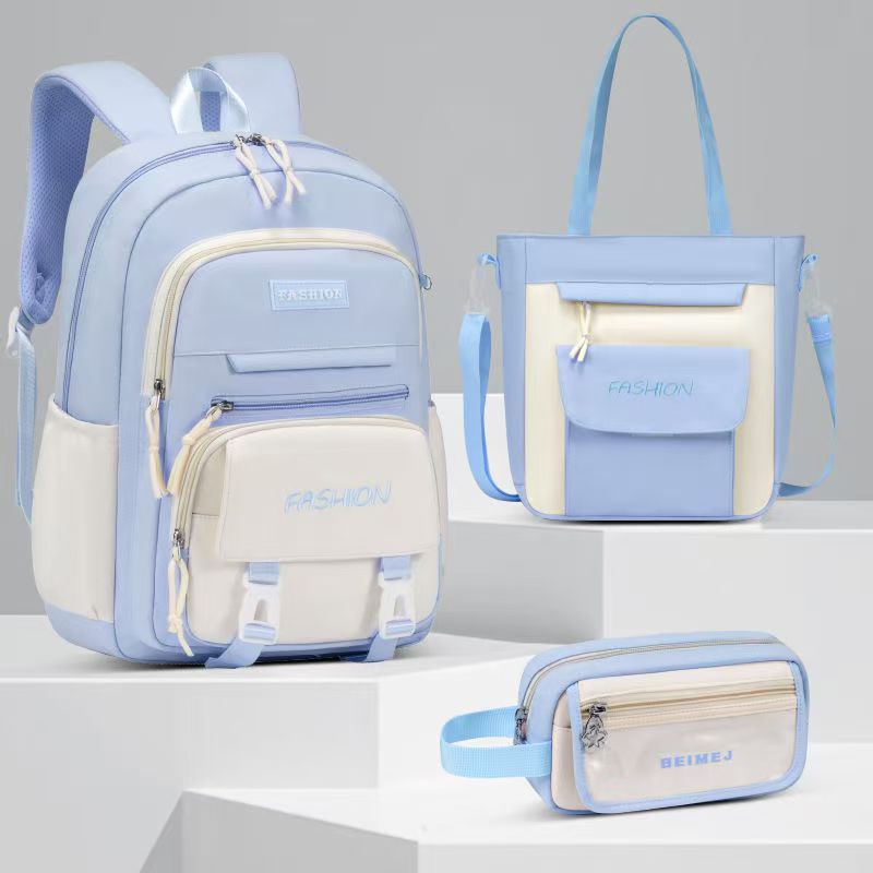 Estudiantes de secundaria primaria de alto valor de cara 2024 bolsas escolares explosivas de gran capacidad para mujeres mochila de hombro ultra ligera estilo japonés simple