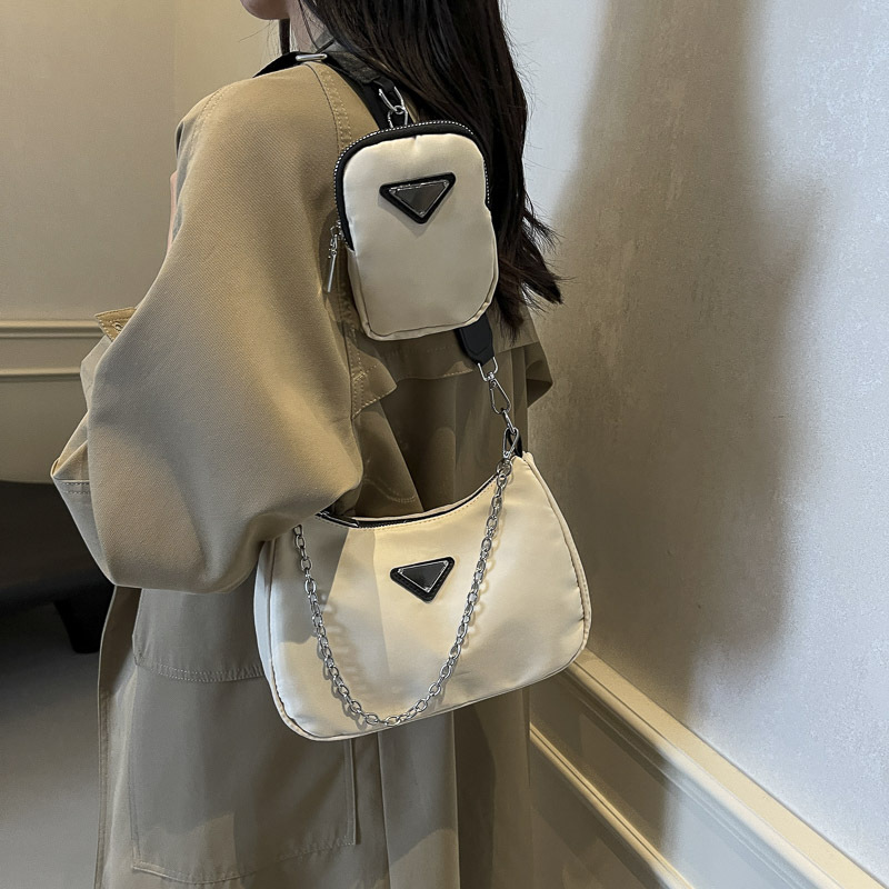 2024 otoño nuevo bolso femenino textura tela impermeable bolso de axila cadena de todo fósforo bolso de mensajero de un solo hombro para mujer