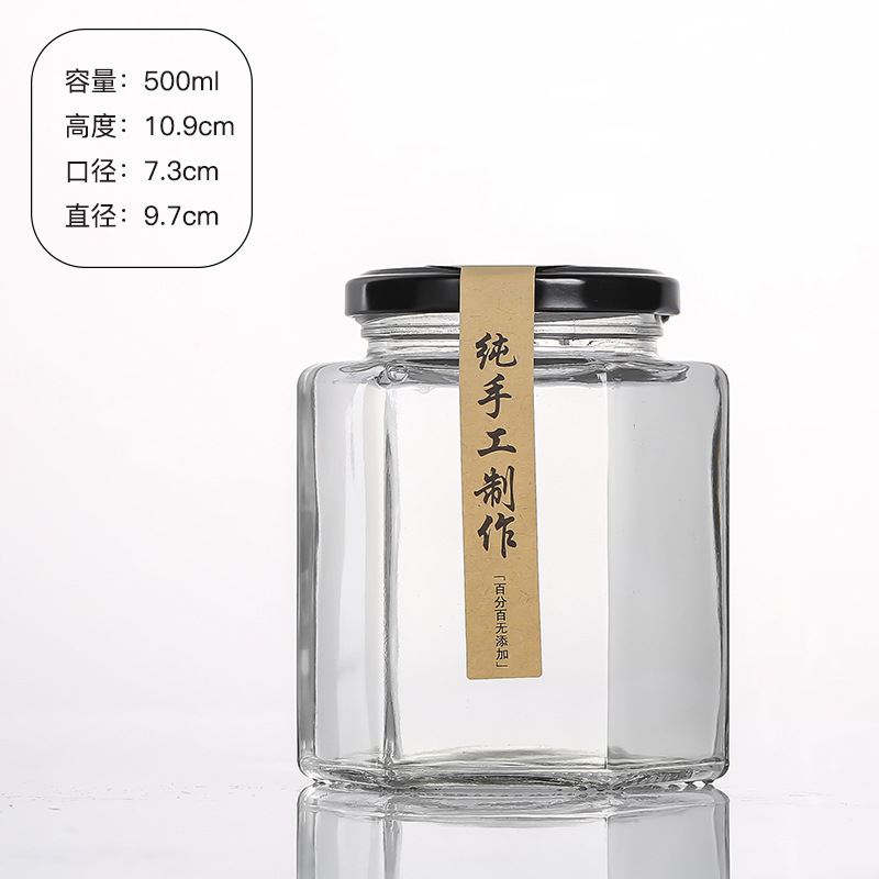 Hexagonal de vidrio enlatado sellado de grado alimenticio con tapa vacía un kilo de pasta de limón, miel, pimienta, botella de mermelada