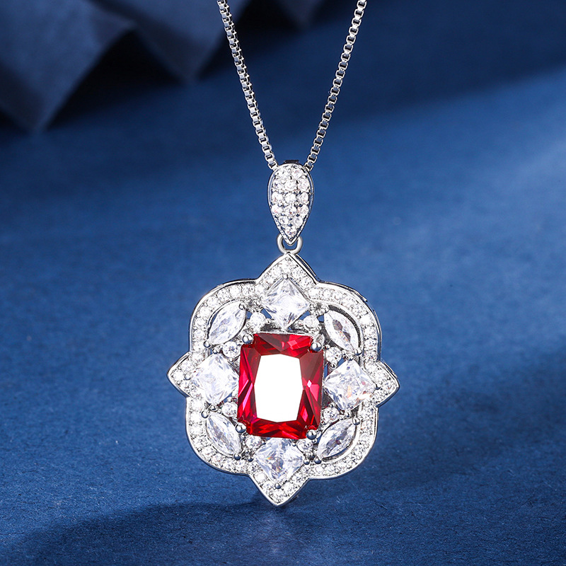 2024 nuevo estilo Zhuang Shengsheng joyería fondo de cobre chapado en oro simulación corindón rojo cristal puntiagudo azul traje retro avanzado mujer 8*10