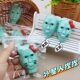 Cross-border creative little red book with alien pinch music decompression funny face doll toy cartoon decompression god