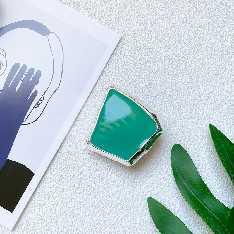 Creativo soporte de airbag para teléfonos móviles galvanizado cuadrado de metal simple de alto nivel sensación de retroceso retráctil soporte de escritorio sólido