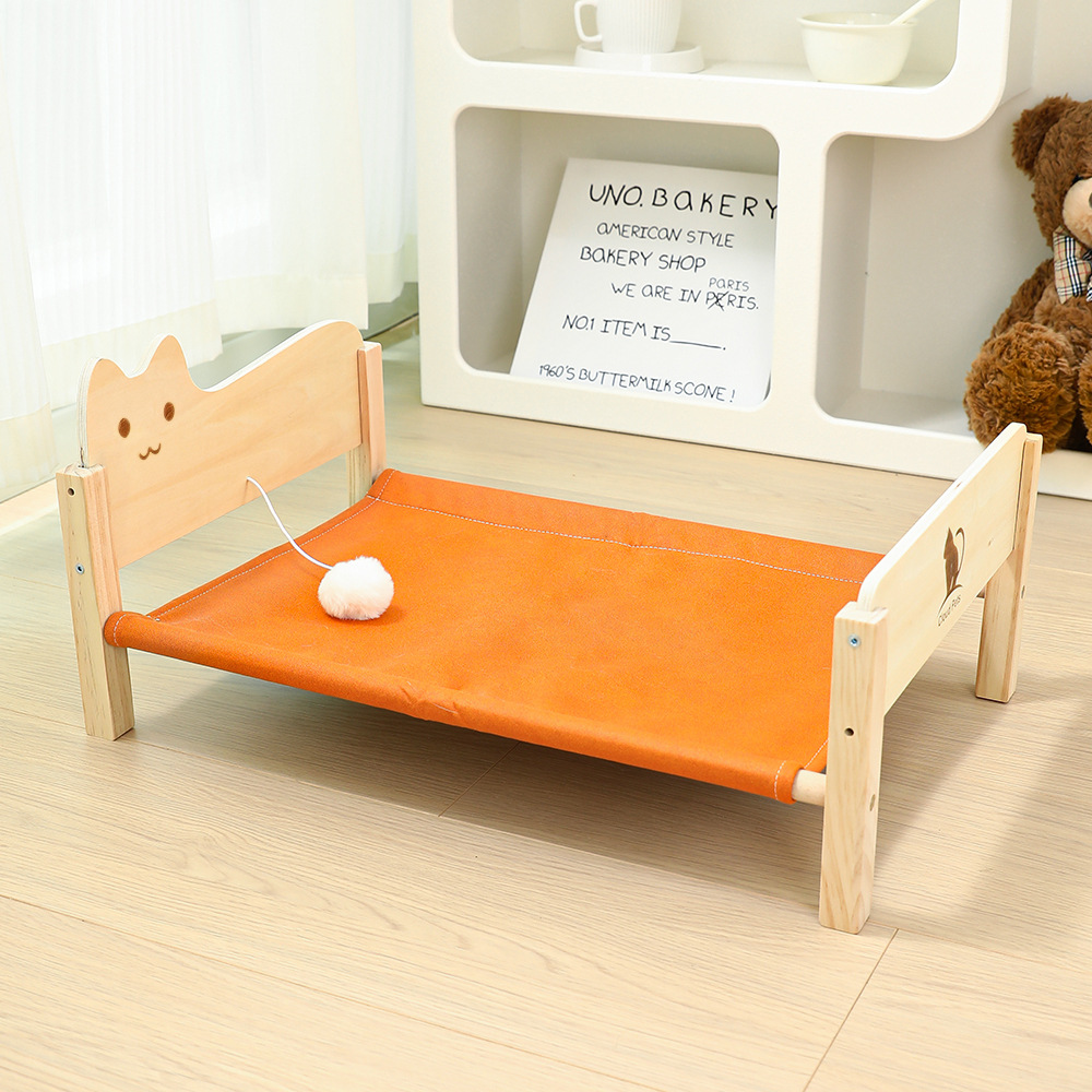 주황색 고양이 무늬 침대