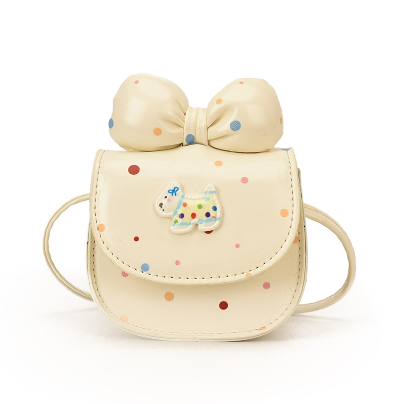 2026 nuevo bolso infantil caricatura perrito lindo arco bolso de cambio de moda punto de onda bolso accesorios de niña pequeña