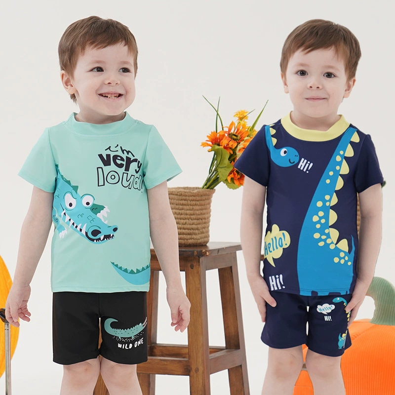 Новый детский купальник для мальчиков 2025 года, комплект из двух предметов для малышей и детей младшего возраста, с защитой от солнца, быстросохнущий, с рисунком динозавра и шапочкой для плавания