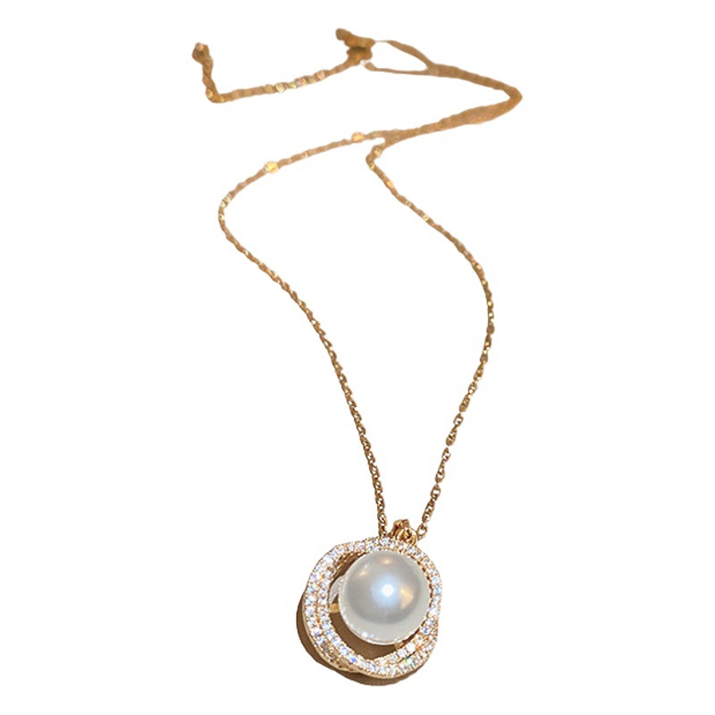 Zircon de acero de titanio que rodea COLLAR COLGANTE de perlas pendientes traje francés Retro Luz de lujo Cadena de clavícula collar de moda para las mujeres