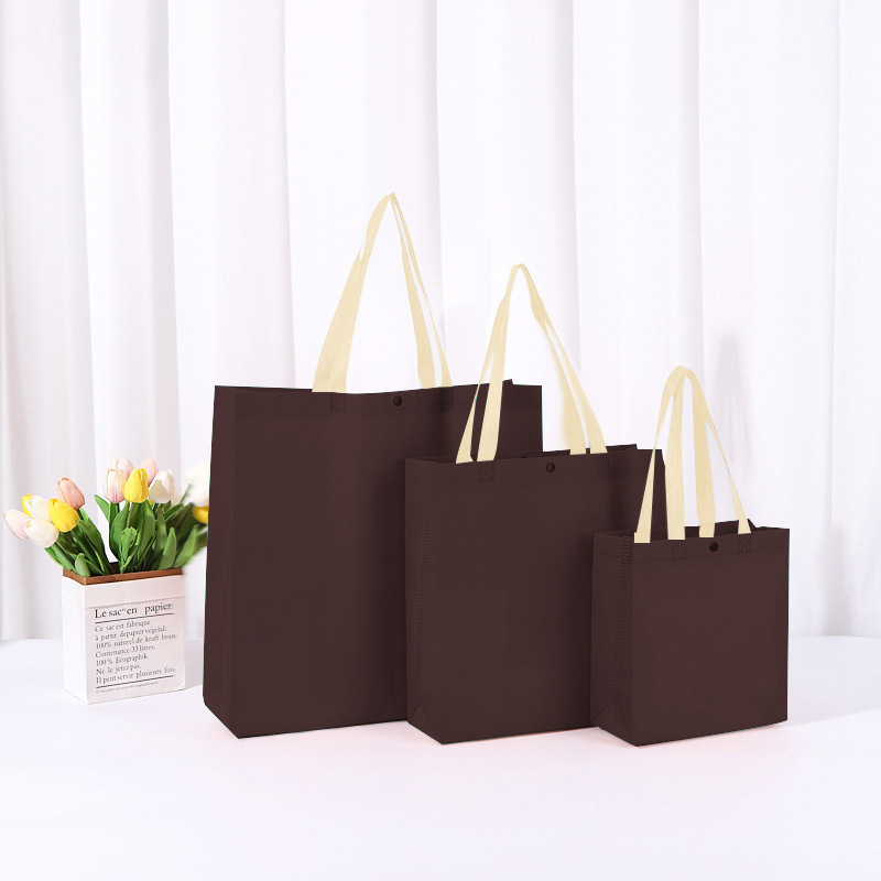 不織布バッグ、既製品、留め具付きハンドバッグ、カラーブロックショッピングバッグ、卸売、印刷入り衣料品包装袋、エコバッグ|undefined