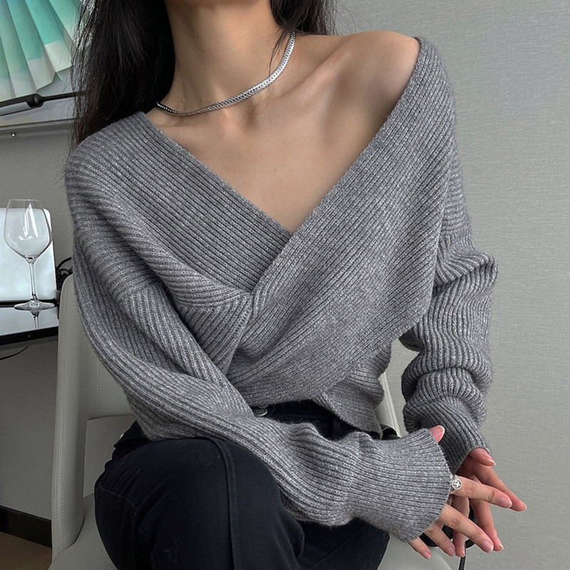 秋のvネックの底のニットの婦人服の秋冬の怠惰な風の上着のデザイン感は交差して不規則なセーターの潮があります。|undefined