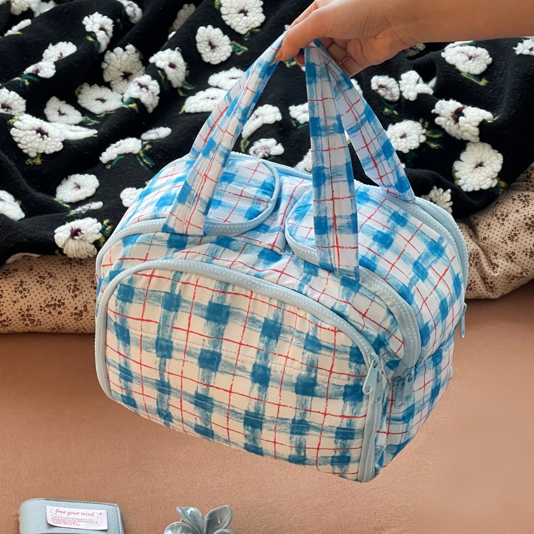 Nueva bolsa de maquillaje de gran capacidad de viaje bolsa de lavado portátil de gran capacidad de apertura amplia bolsa de almacenamiento de partición portátil