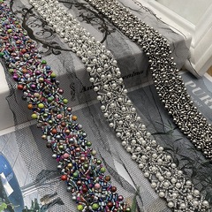 Factory-made single-layer mesh fabric, hand-crocheted beaded trim, handmade beaded lace—wedding gown and apparel accessories