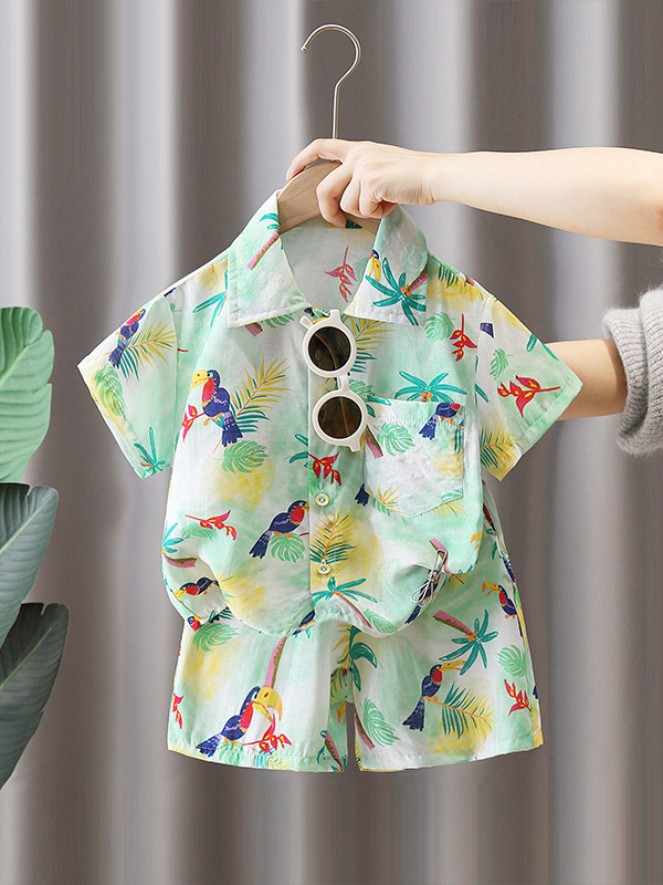 7115 Traje de verano para niños Camisa de estilo de playa de manga corta para niños 2025 Nuevo traje de dos piezas de viaje de verano para niños