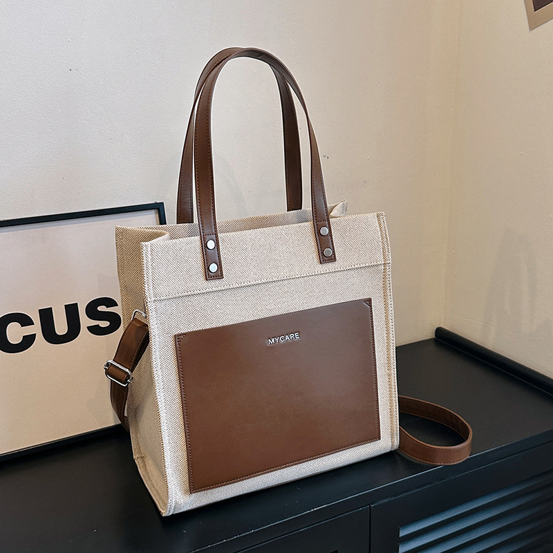 Bolso portátil de lona personalizado para mujer nueva tendencia con logotipo impreso en color casual bolso de mensajero de viaje de negocios
