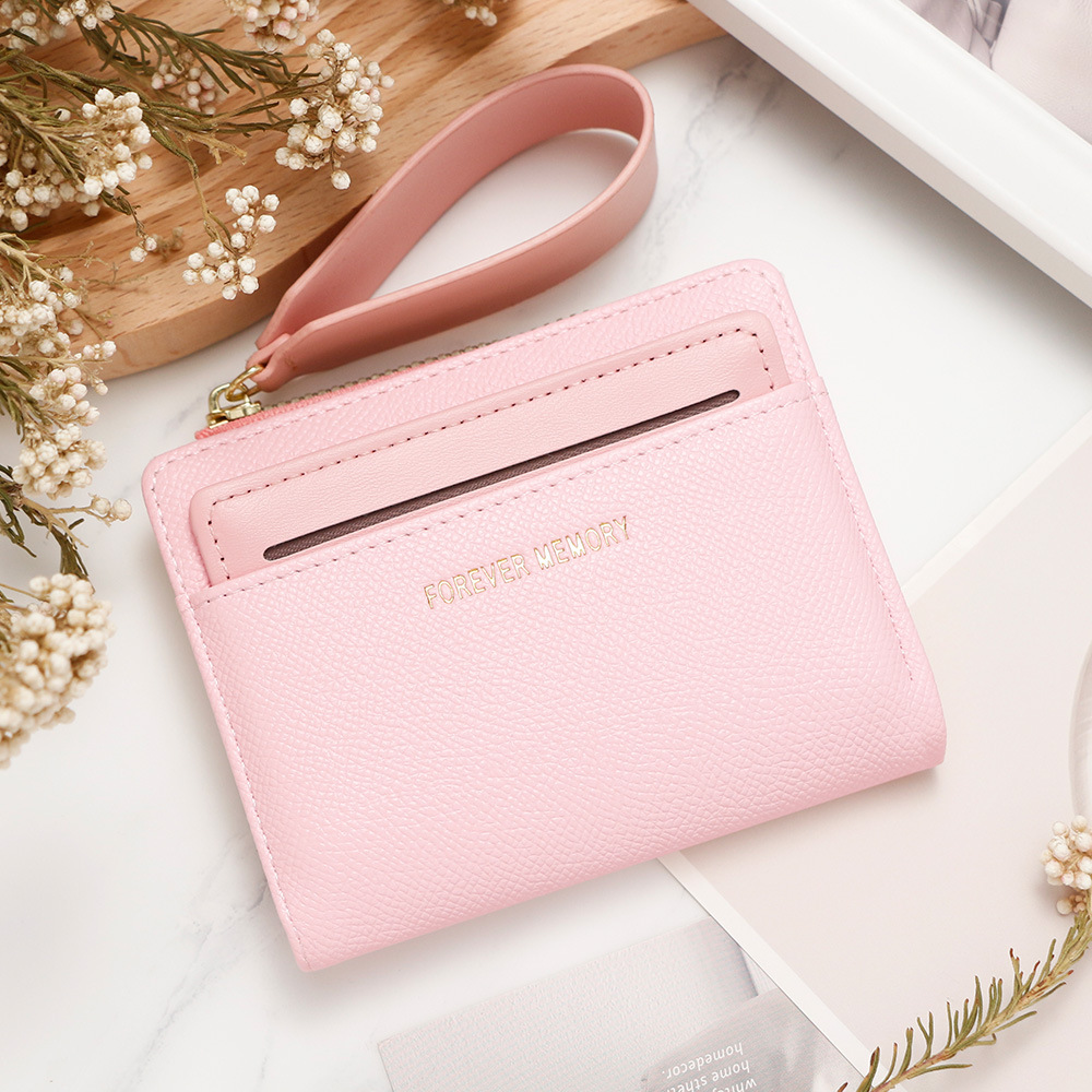 Nueva billetera corta de mujer fresca y simple doble cremallera bolso de cambio multi-tarjeta bolso multifuncional