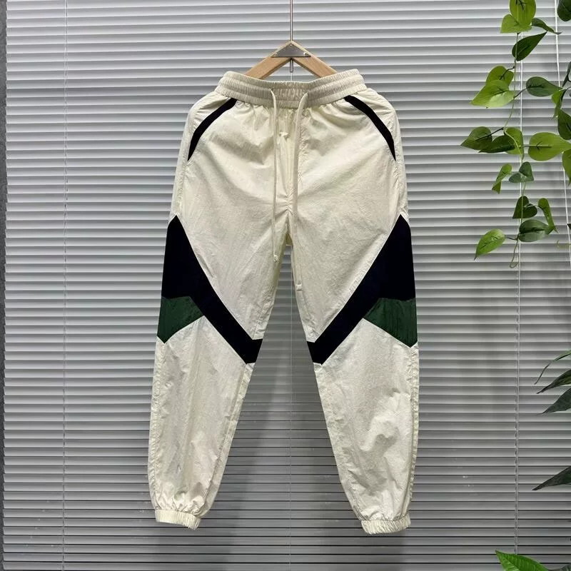 Осенние новые мужские цветовые брюки с пучком повседневных брюк с эластической талией