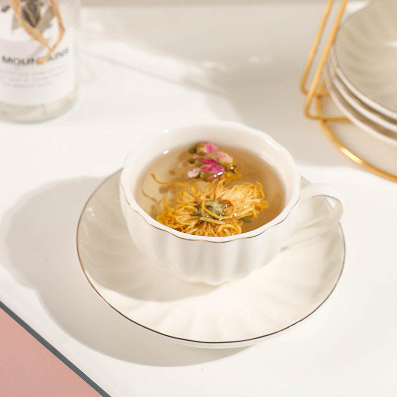 Comercio exterior de cerámica taza de café platillo juego de té regalo simple flor taza de té hogar taza de agua café traje de regalo con estante