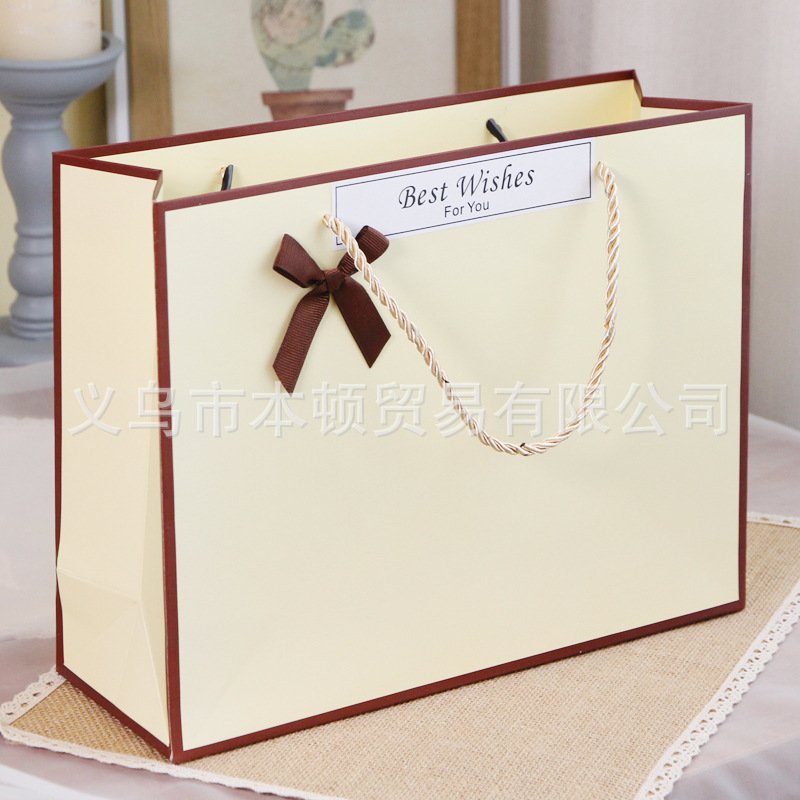 现货特价加厚礼品袋白卡纸袋包装袋购物牛皮纸手提袋覆膜压纹袋子