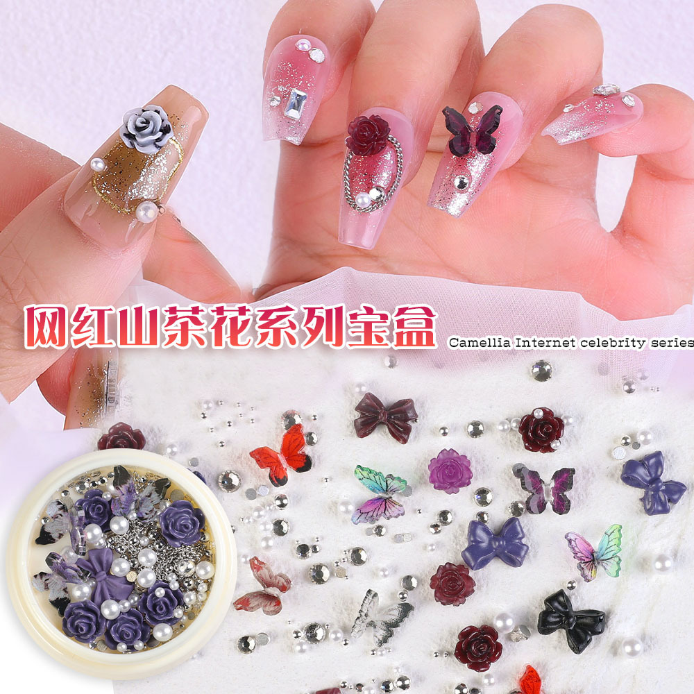 2023 nuevos accesorios de manicura camellia material paquete cadena de mariposa rosa arco mezcla combinación