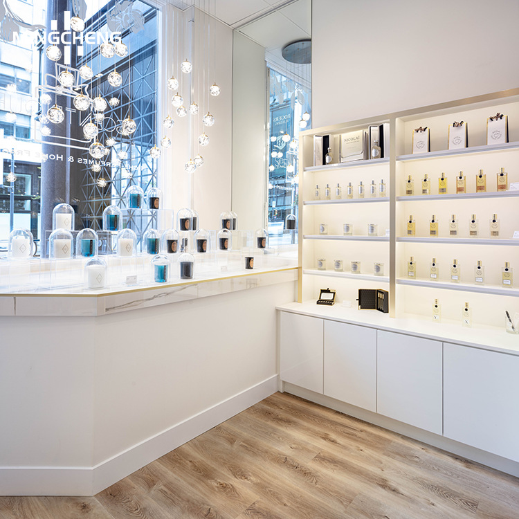 高档彩妆化妆品展示柜设计手作香薰流水台烤漆面霜礼盒中岛展示柜