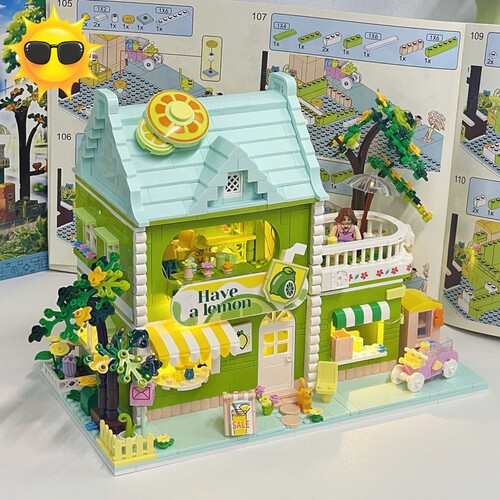 Zhegao mini street view lime tea shop chocolate workshop small particles compatible with Lego building blocks assembled educational toys