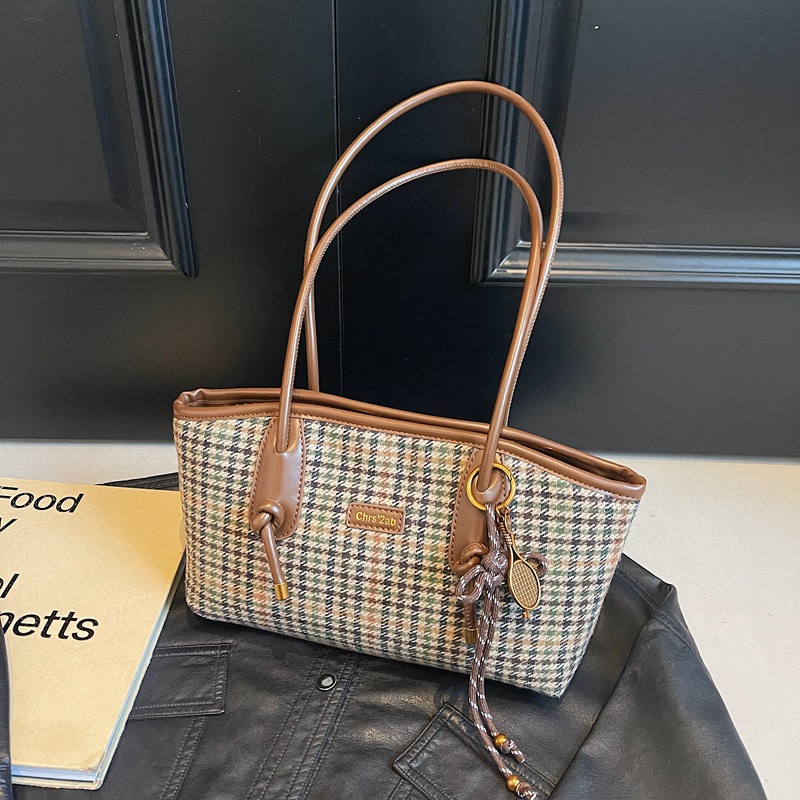 Coreano 1000 pájaros estilo extranjero hombro brazo bolso de viaje de gran capacidad para mujeres 2025 nuevo bolso de moda