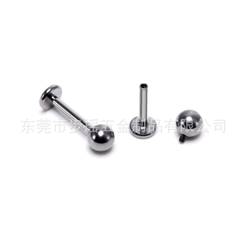 Metal earrings, lip piercing