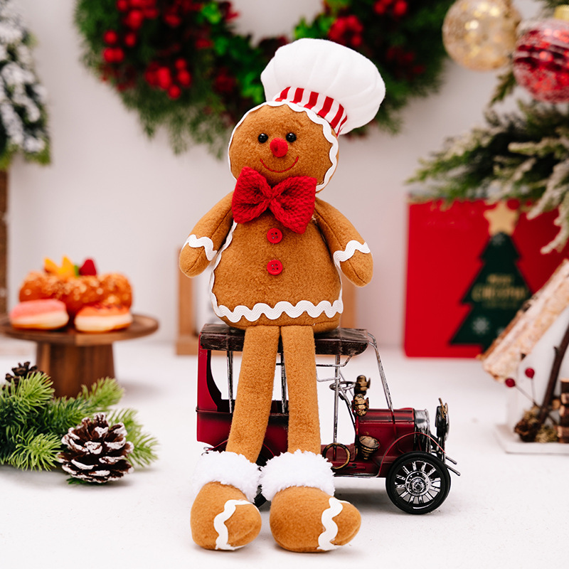 2種類のアマゾンの新しいクリスマスの姜パイ人は足の公仔のクリスマスのビスケット人を掛けてショーウインドーの雰囲気を飾っています。|undefined
