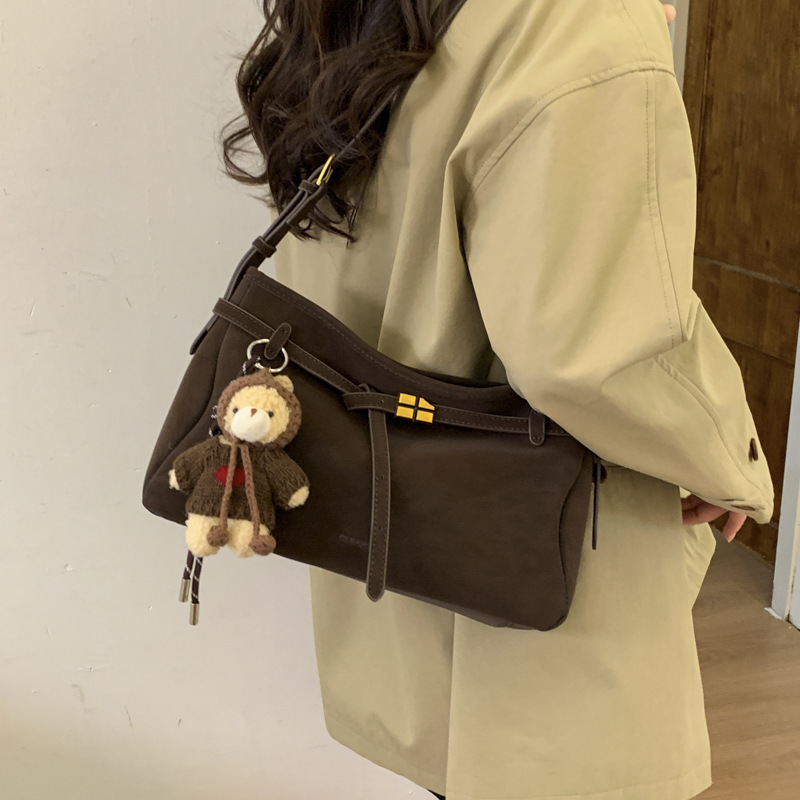 Bolsa retro de hombro debajo de la axila para mujeres 2025, otoño y invierno, nuevo estilo de alta sensación de mochila coreana, bolso de viaje al trabajo