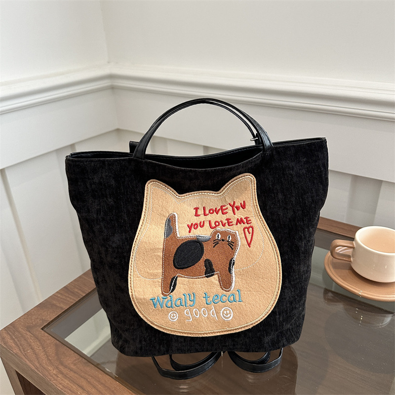 Bagos de gran capacidad para chicas encantadoras otoño / invierno 2024 nuevo estilo retro bolso de hombro de moda alta sensación bolso de brazo