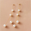 Design long earrings from pearl, silver 925 sample, trend of season