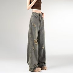 レトロな穴の乞食のストレートジーンズの女性の春の新型のデザイン感があります。