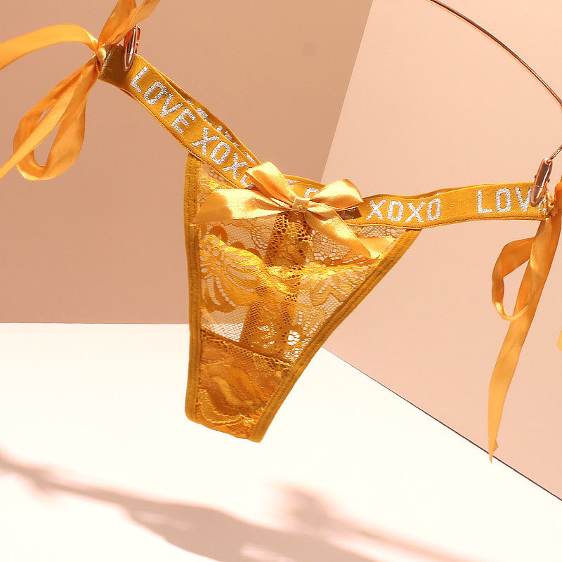 Foreign trade lace-up letter transparent underwear women's sexy seamless plus size high elastic perspective ultra-thin bow thong summer