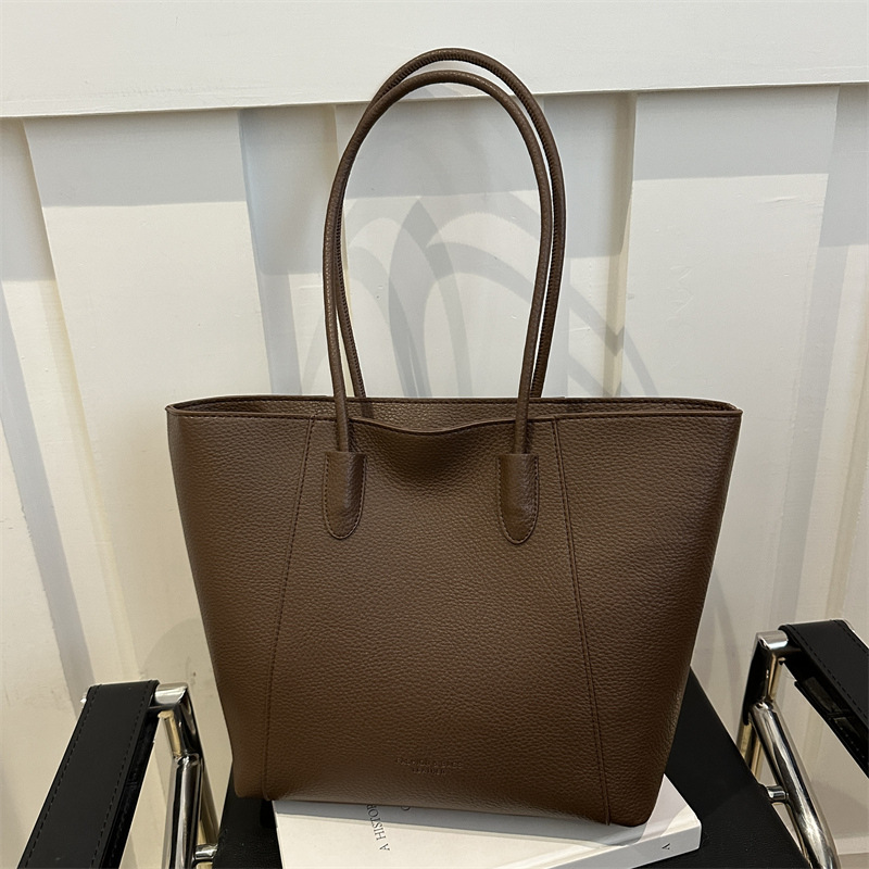 2024 nueva moda de color sólido ocio de viaje sencillo bolso de hombro para mujeres gran capacidad suave retro mujer