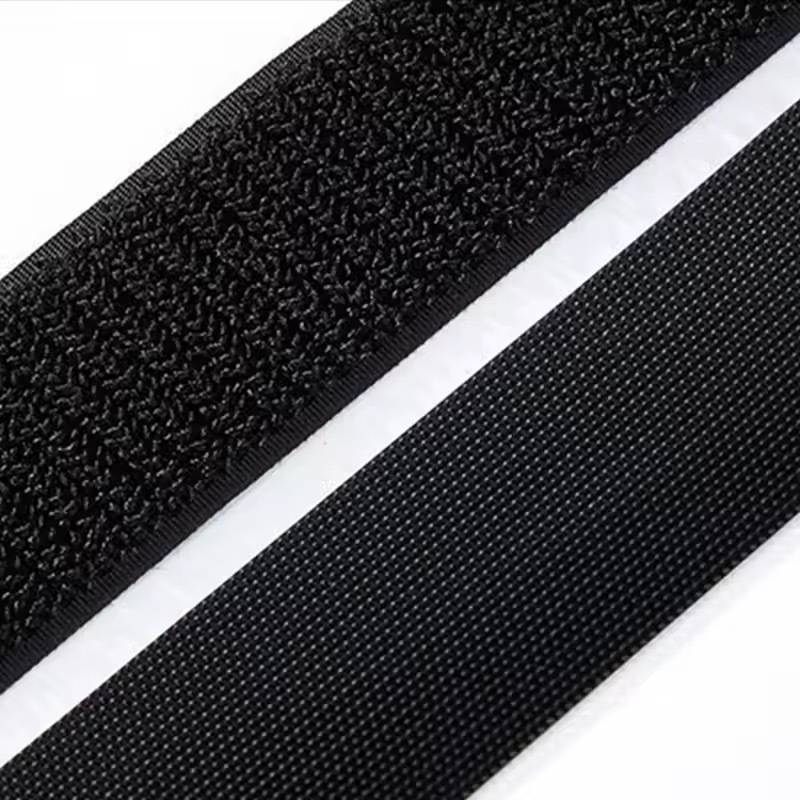 Fábrica de gancho de inyección negro en stock Velcro de alta adhesión no araña el pelo Velcro de cierre de velcro de nylon grado A