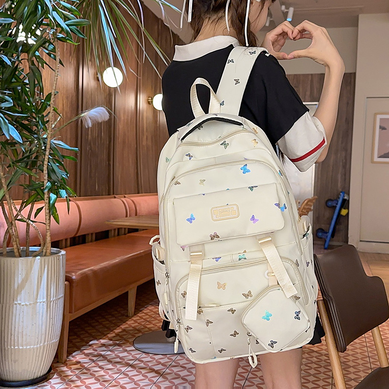 Cute mochila de gran capacidad nueva mochila de estudiantes de viajes de secundaria y secundaria de alto valor de la cara mochila de hombro de estudiantes en venta caliente