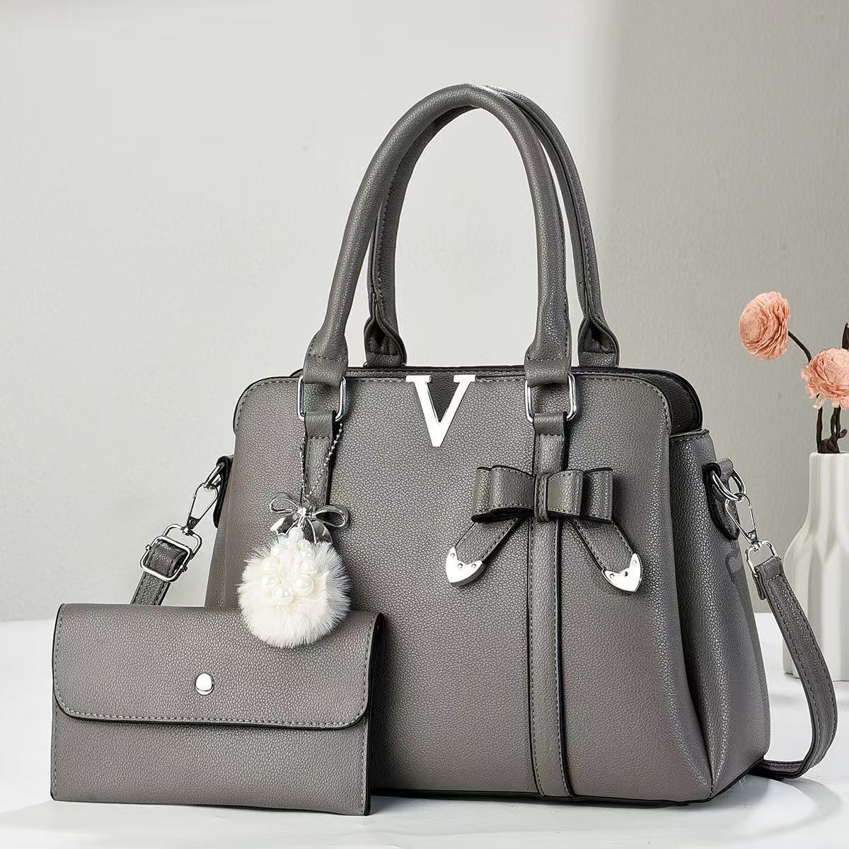 Bolsos grandes de marca de lujo ligero, bolsos de mujer, 2025 nuevo bolso de hombro de moda, sentido de alta gama, gran capacidad